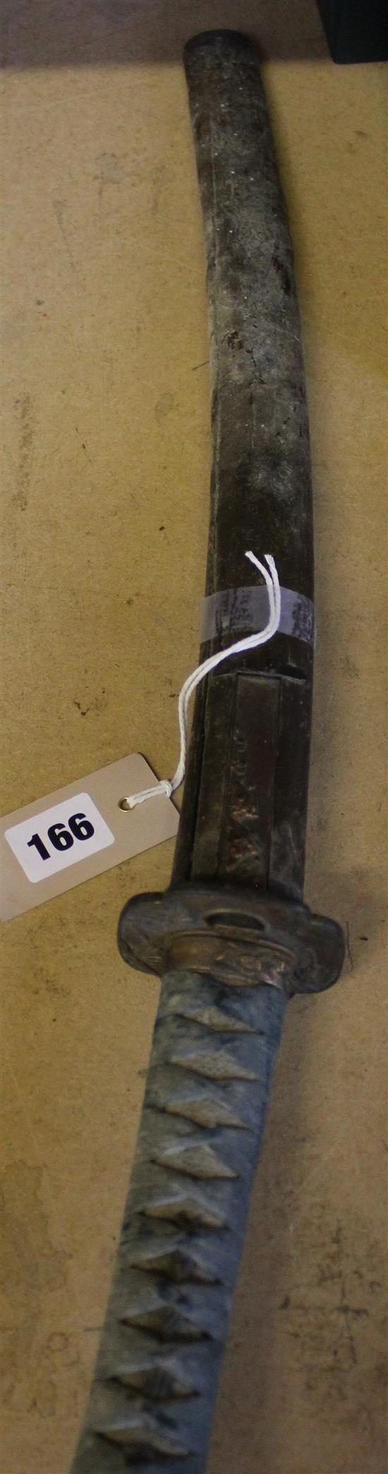 Japanese wakizashi, the hilt with floral and foliate-decorated tsuba, in decorative sheath (a.f)